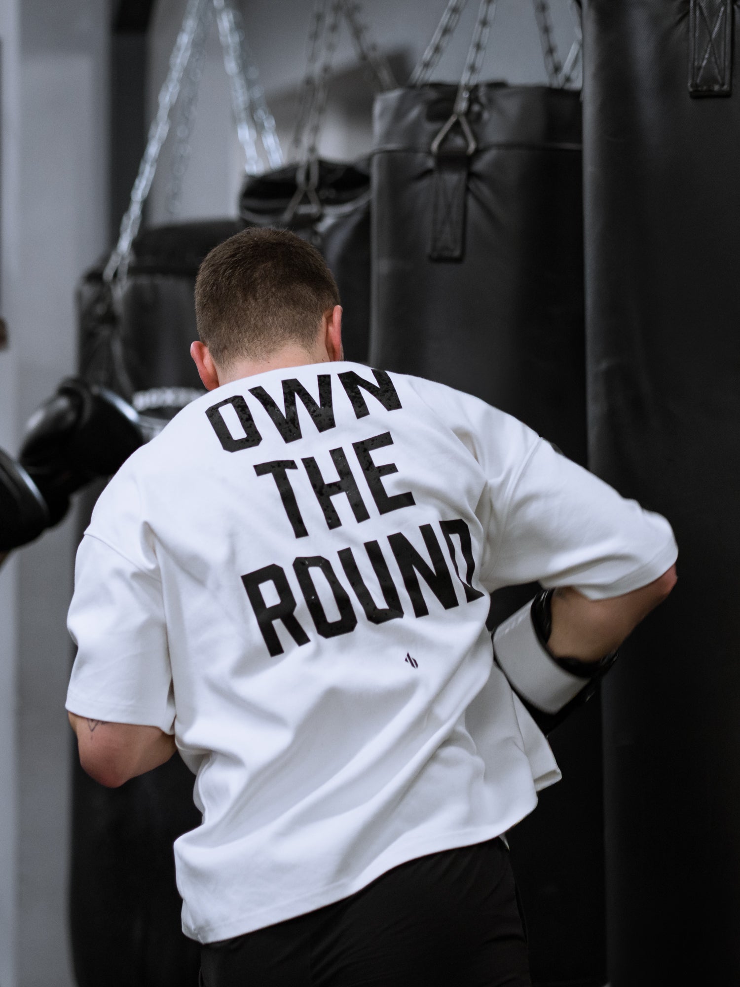 ONE BOUT Men's Own The Round Oversized T-Shirt in White — close-up