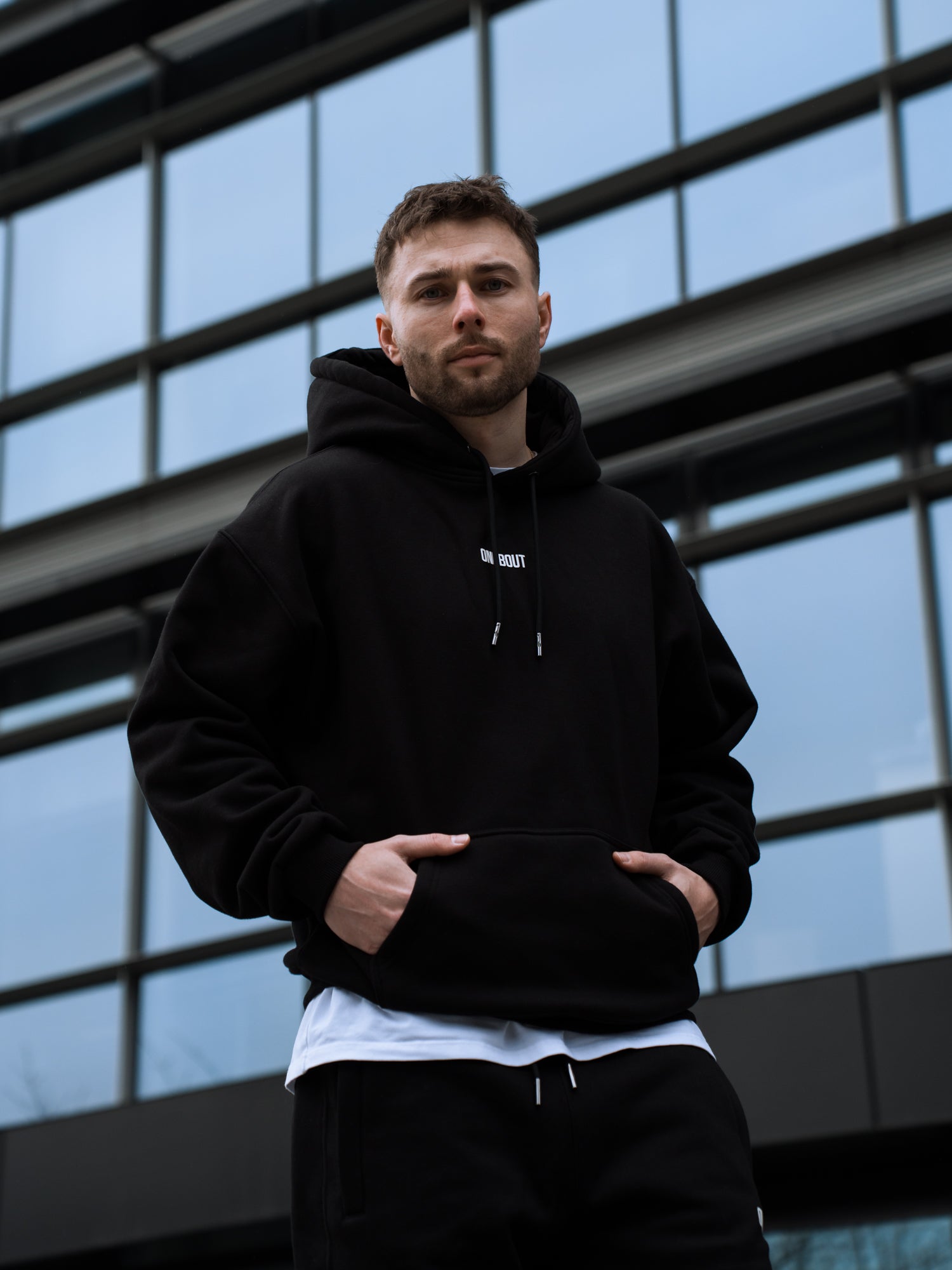 ONE BOUT Men's Script Oversized Hoodie (Limited) in Black — close-up