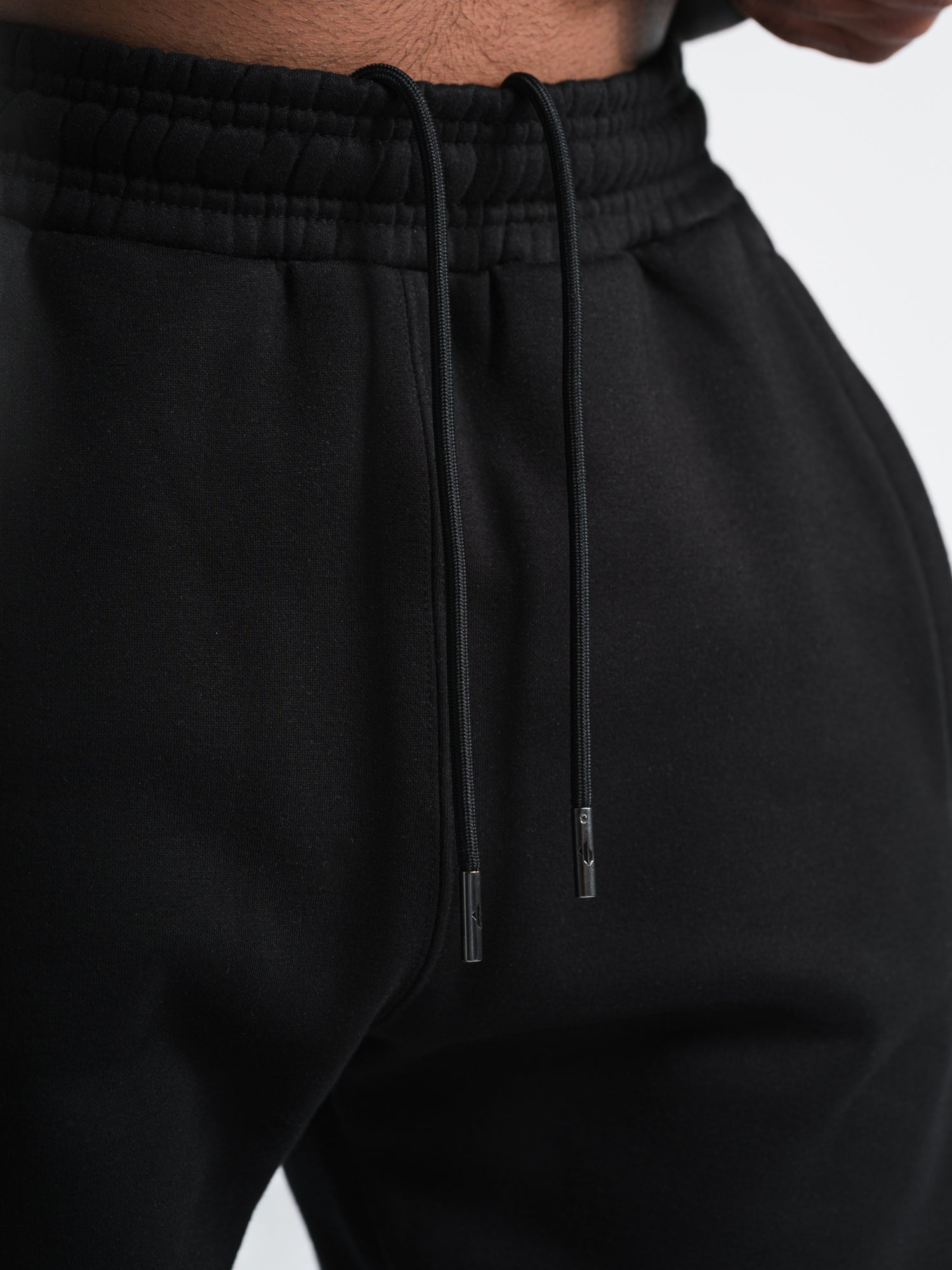 ONE BOUT Men's Script Bottoms in Black — styled