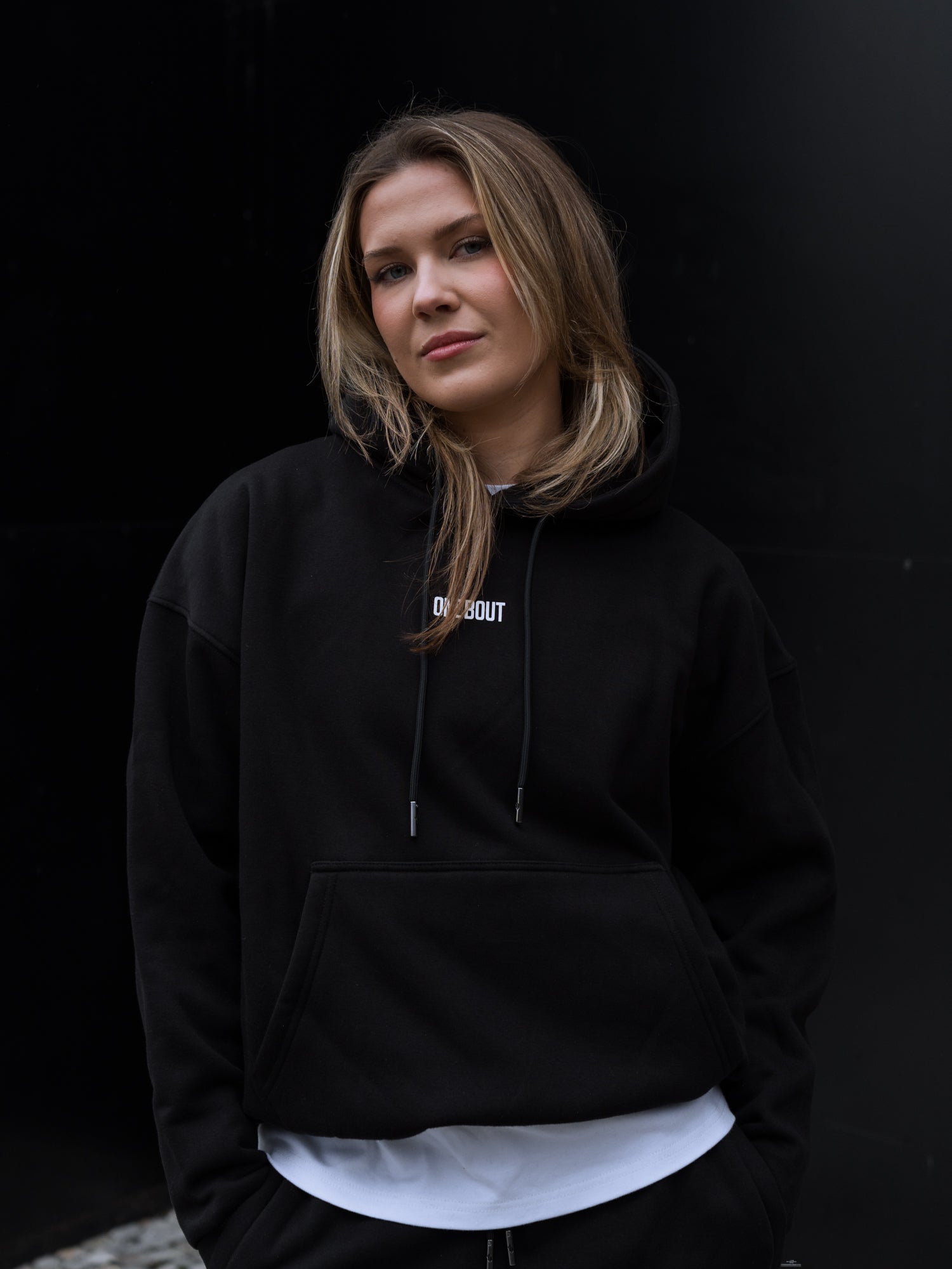 ONE BOUT Women's Script Oversized Hoodie in Black — close-up