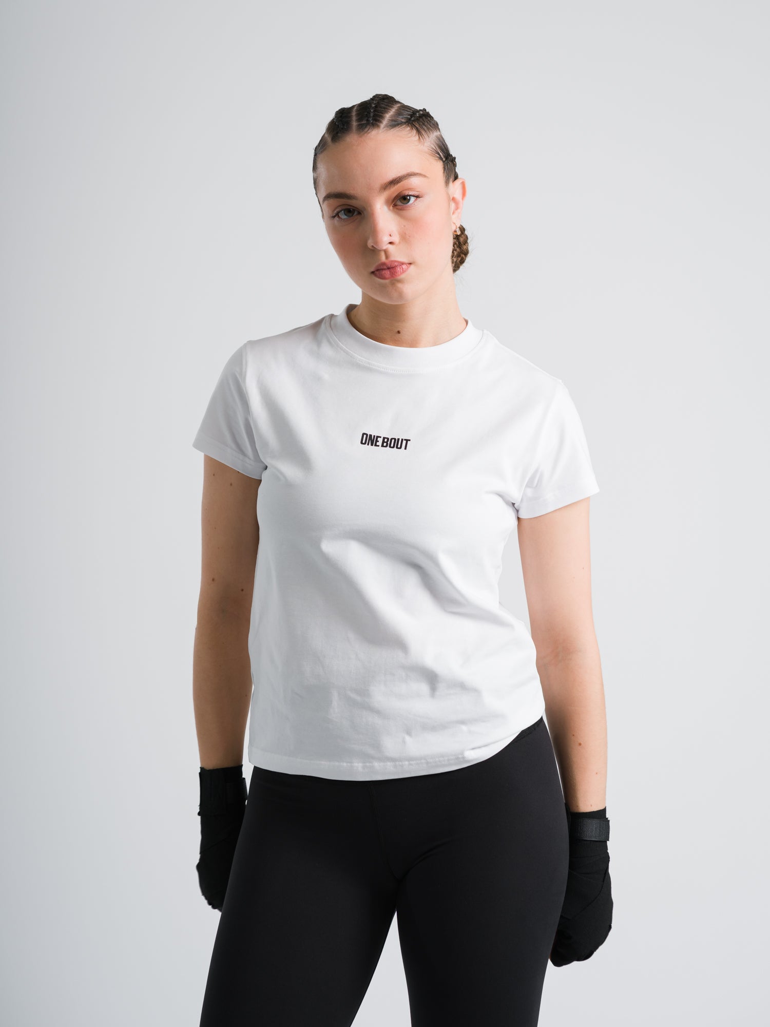 Female model wearing white ONE BOUT Script T-Shirt