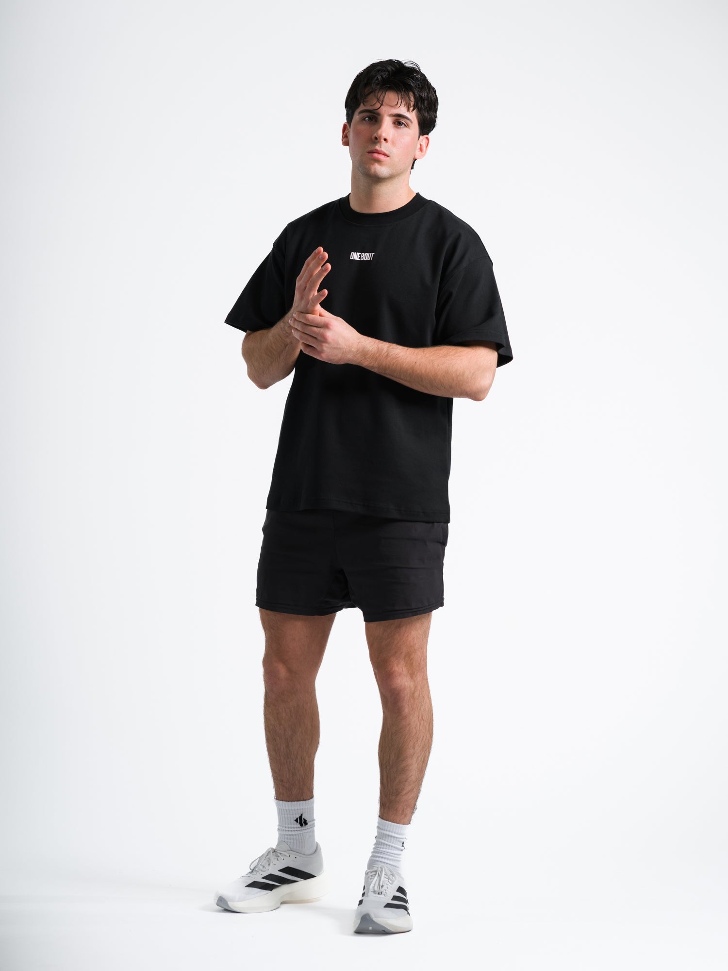 ONE BOUT Men's Own The Round Oversized T-Shirt in Black — front view