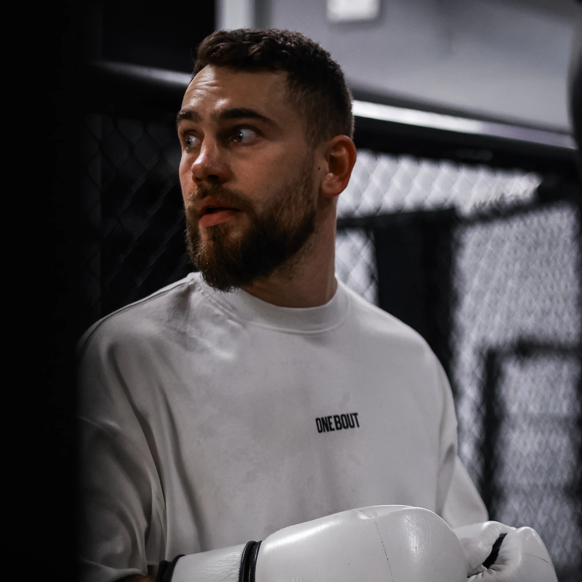 Jan Rychtařík, combat sports coach, in a white One Bout tee