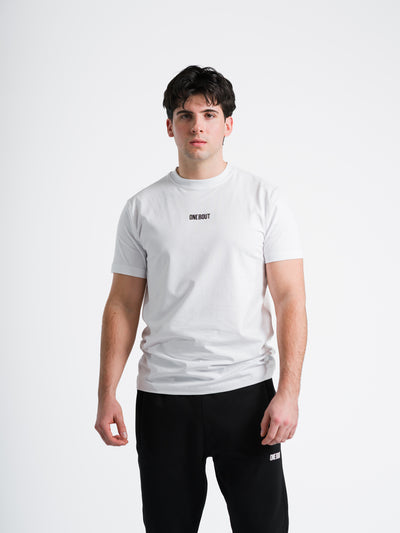 Male model wearing white One Bout Script T-Shirt